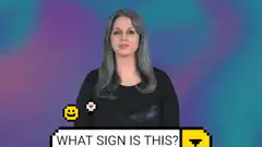 Woman demonstrating ASL signs