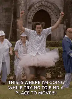 Man in tutu jumping excitedly