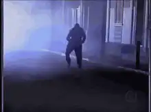 Ghostly figure dancing in fog