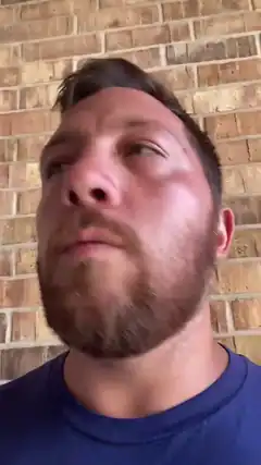 Man looking up with beard