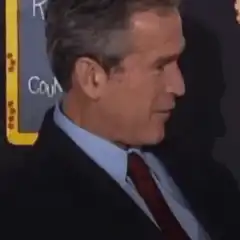 George W Bush smirking