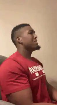 Man in red shirt dramatically falls back