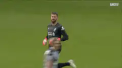 Alisson Becker runs onto pitch during fight