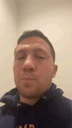 man chewing with eyes closed