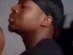 Man in durag making disgusted face