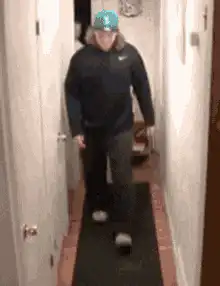 Girl trips and falls in hallway
