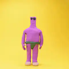 Purple clay figure dancing