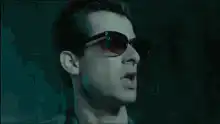 Man in sunglasses screaming