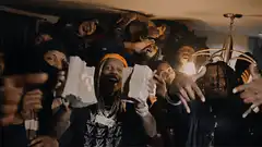 Soulja Boy holding stacks of cash