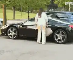 Woman gets into Ferrari and drives away