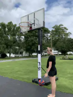 Girl makes a basketball shot