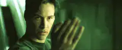Neo stops bullets with hand