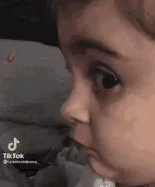 Baby looking around with wide eyes