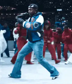 Tupac Shakur performing on stage