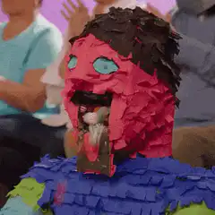 Pink piñata vomiting candy