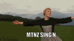 Maria von Trapp singing in the mountains