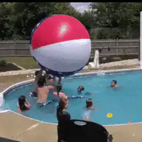 giant beach ball hits kid in pool