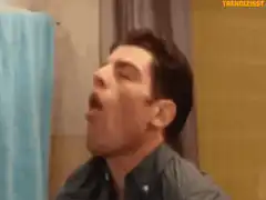 Man coughing into fist