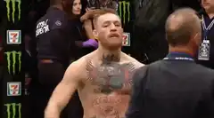 Conor McGregor celebrating in the octagon