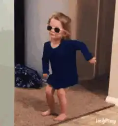 Toddler dancing in sunglasses