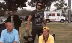 Dancing man with folding chair