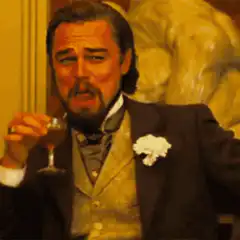 Leonardo DiCaprio toasting with a drink