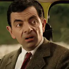 Mr. Bean's confused and smug face