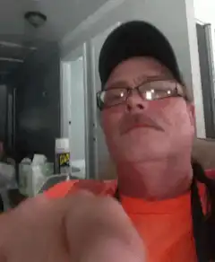 Man points finger at camera
