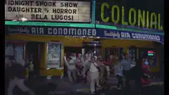 Crowd running from zombie movie