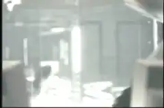 Man jumps through glass office window