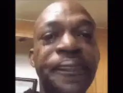 Man crying and looking up