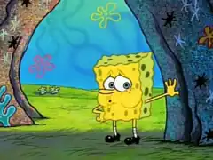 SpongeBob waving from behind a tree