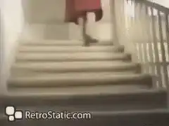 Old lady falls down stairs