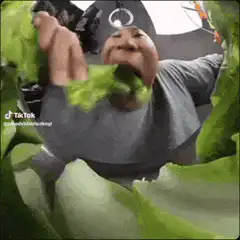 Man eating lettuce with funny face filter
