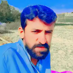 Man with blue hair and beard