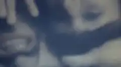 Scream poster flying over city
