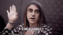 I'm Suing! Woman raising hand