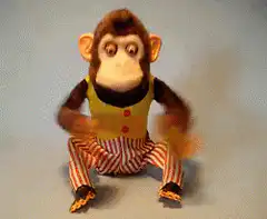 Toy monkey playing cymbals