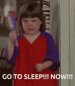 Angry toddler with hairbrush
