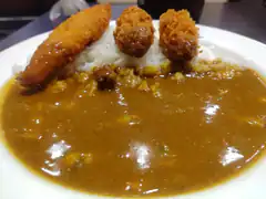 curry rice with fried chicken and croquettes