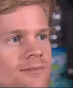 Man raising eyebrows in surprise