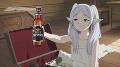 Frieren holding a Sapporo beer