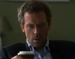 Dr. House shocked then covers mouth