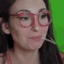 Woman with changing glasses and straw