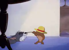 Tom gets his nose pulled by Jerry
