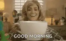 Woman drinking from giant mug