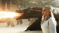 Daenerys stands calmly as dragon breathes fire