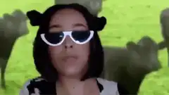 Woman in cow ears and sunglasses