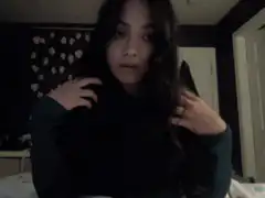 woman playing with her hair