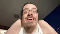Man making funny face with tongue out